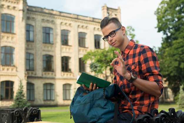 Side view medium shot teenage boy showing approval