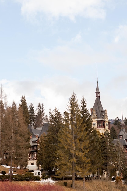 Side view of Peles Castle from Sinaia, Romania. Medieval castle