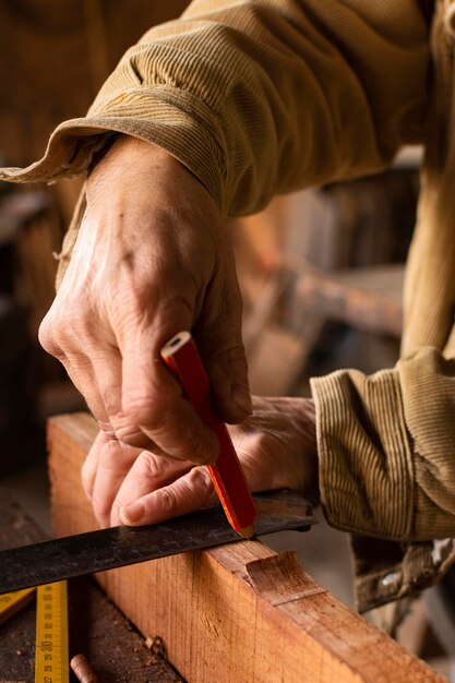 Side view person making a line with pencil