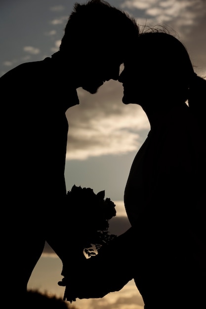 Free Photo side view romantic partners silhouettes