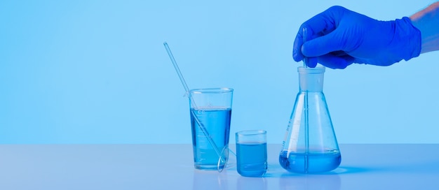 Free photo side view scientist mixing substance