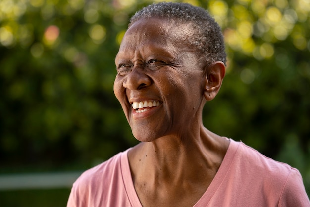 Side view smiley woman outdoors