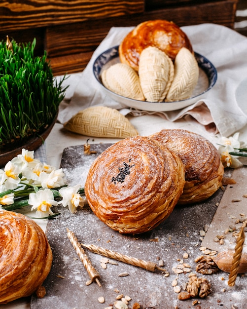 Side view of traditional azerbaijani shorgogal filled with spicy mixture on the rustic with nuts