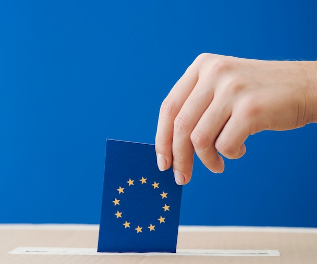 Side view woman being involved in the european election close-up