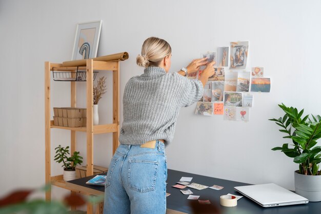 Side view woman creating vision board