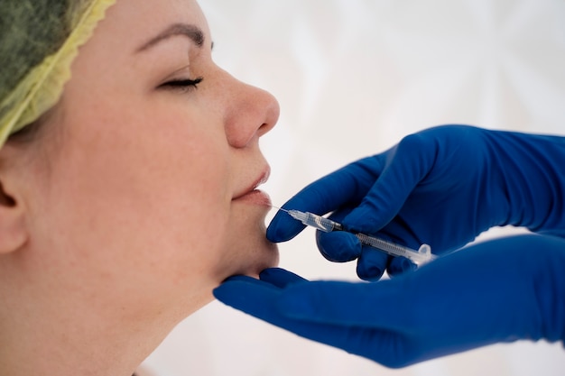 Free Photo side view woman getting injection