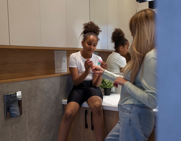 Side view woman holding menstrual cup