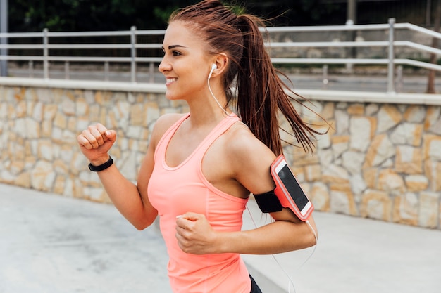 Side view of woman running