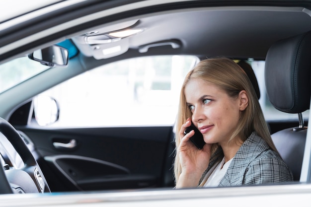 Side view of woman talking on phone