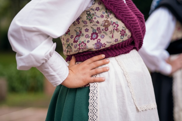 Free Photo side view woman in traditional clothes