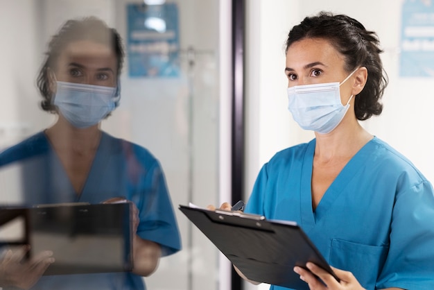 Side view woman wearing face mask