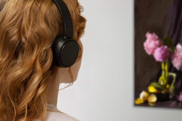 Side view woman wearing headphones