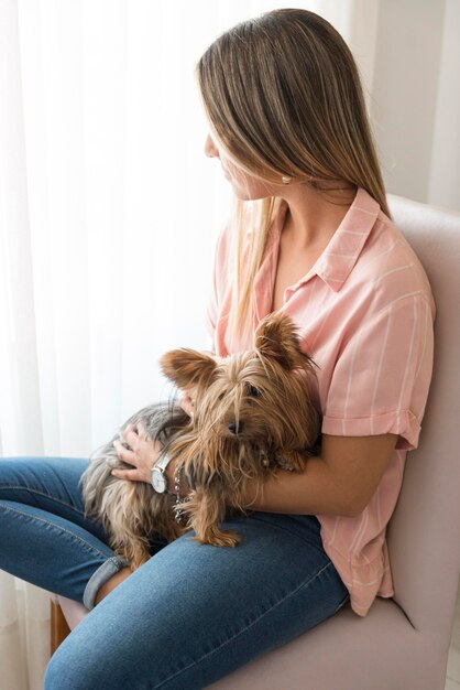 Side view woman with dog