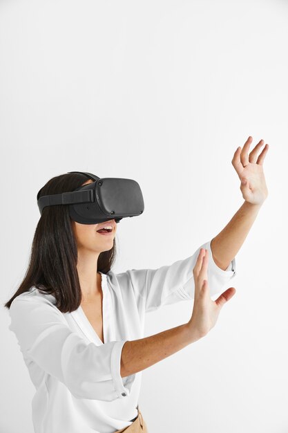 Free Photo side view  woman with virtual reality headset