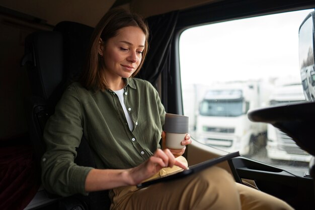 Side view woman working as a driver