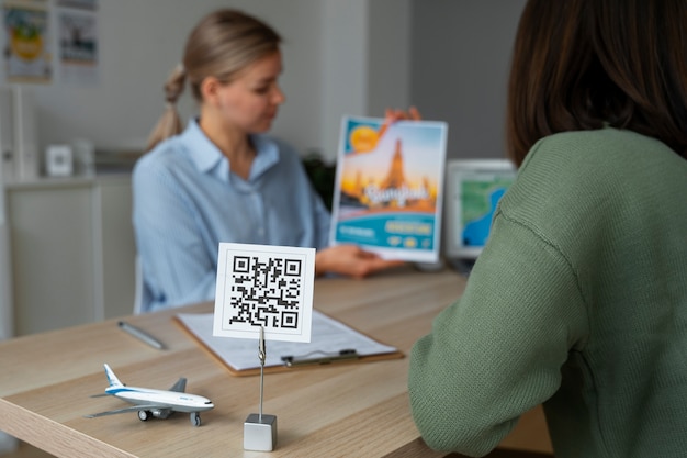 Free Photo side view woman working as a travel agent