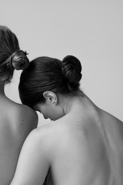 Side view women posing black and white