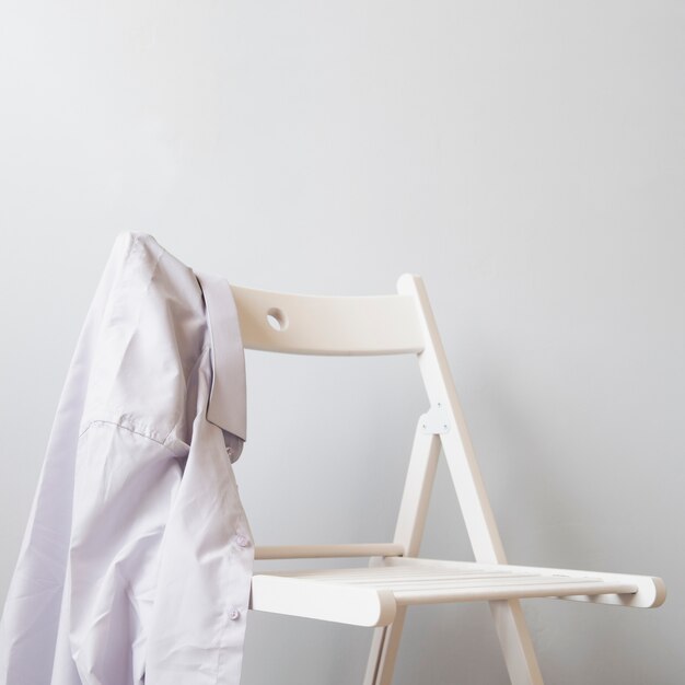 Sideways shirt on a white chair