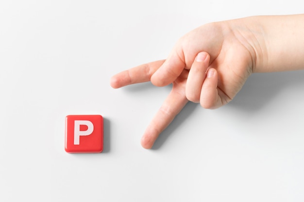 Sign language hand showing letter p