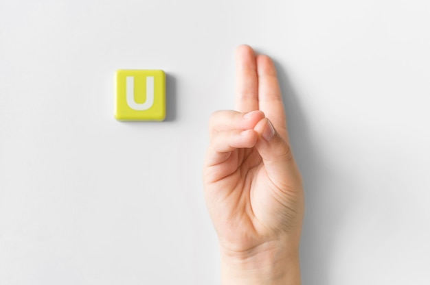 Free photo sign language hand showing letter u