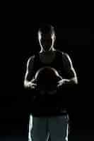 Free photo silhouette of basketball player with ball