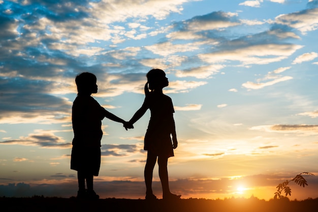 Free photo silhouette of children playing