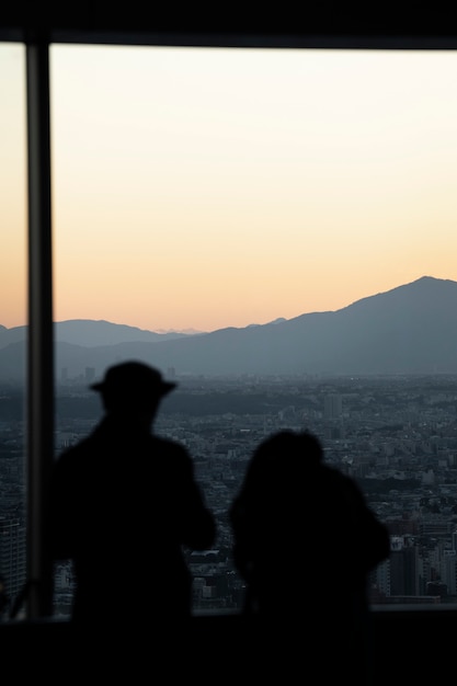 Free Photo silhouette of people in the city