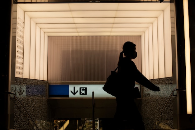 Free Photo silhouette of person in the city