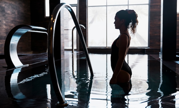 Free Photo silhouette of woman in spa