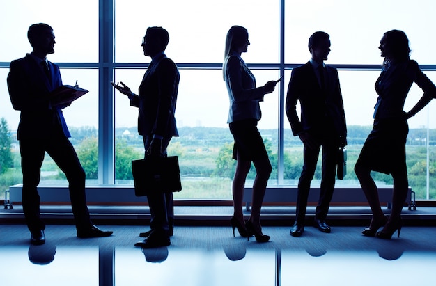 Silhouettes of busy workers