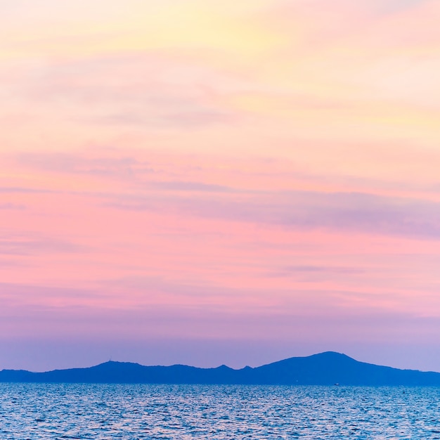 Free photo silhouettes of mountains with pink sky