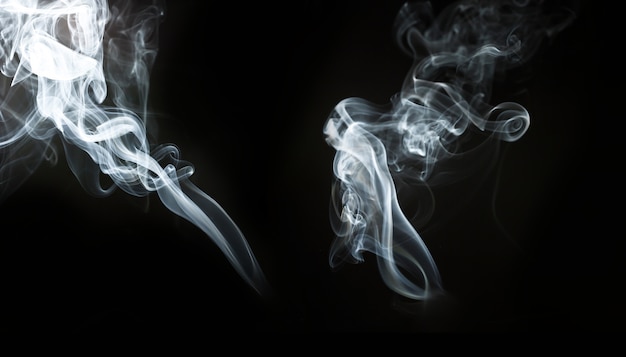 Silhouettes of smoke floating