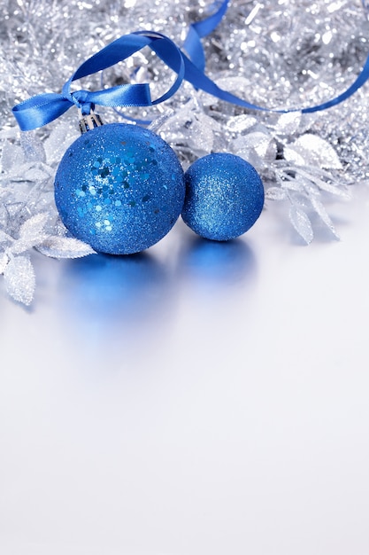  silver christmas decoration with blue baubles