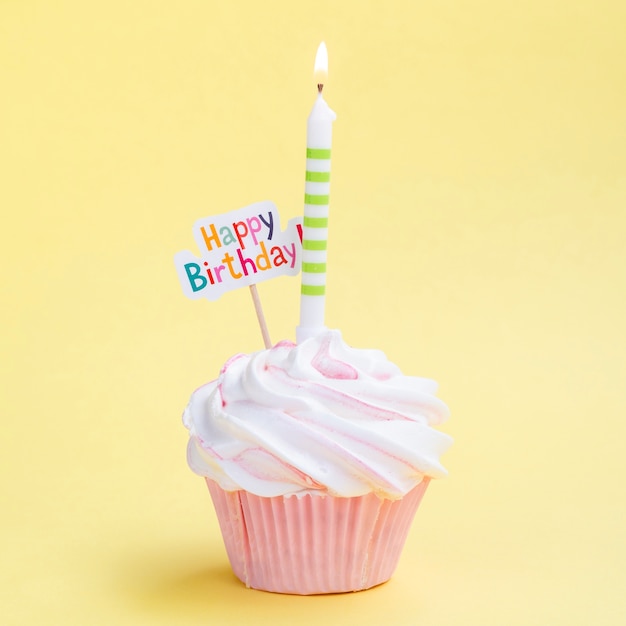 Free photo simple birthday muffin with candle