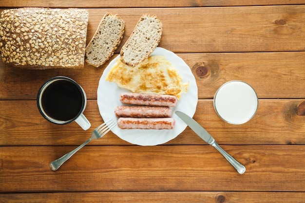 Simple breakfast served on wooden table