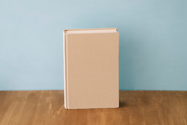 Single book on wooden surface