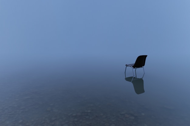 Single chair reflecting on a water surface on a stormy day