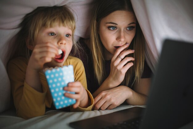 Sisters watching interesting film