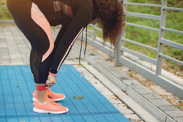 Free photo over the size of a woman doing stretching exercises