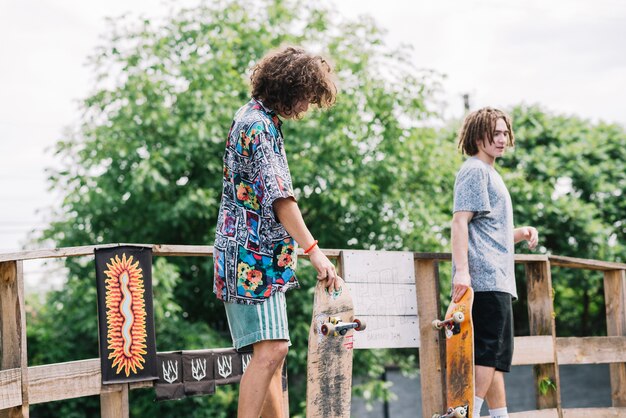 Skateboarders preparing to ride