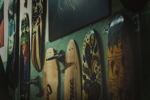 Free photo skateboards in different colors on the wall