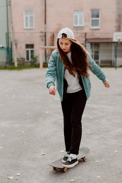 Skater girl riding her skateboard