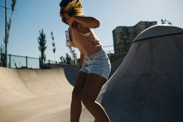 Skater woman with cool pose