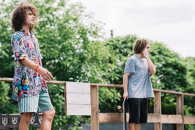 Skaters standing on ramp together