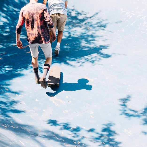 Free photo skaters walking in ramp