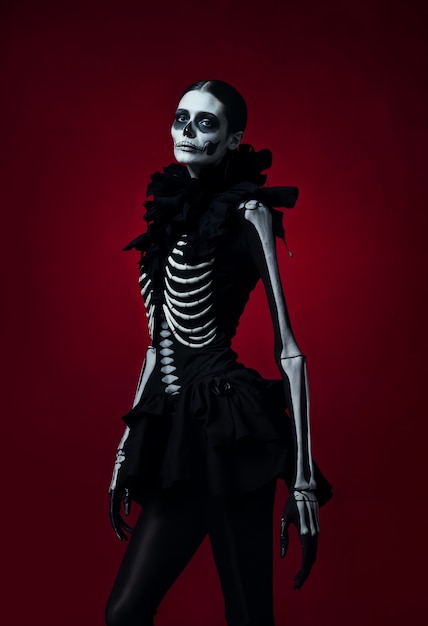 Free Photo a skeleton wearing a black dress