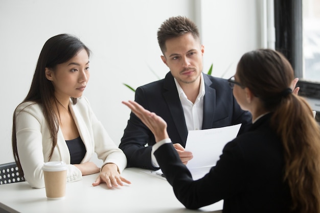 Free photo skeptical diverse hr managers interviewing female applicant, bad first impression