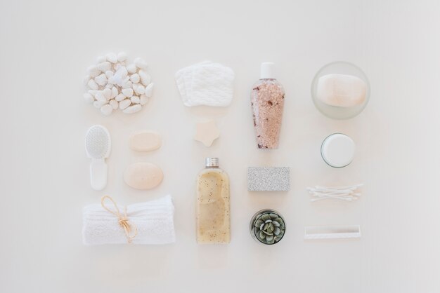 Skin care tools on white table