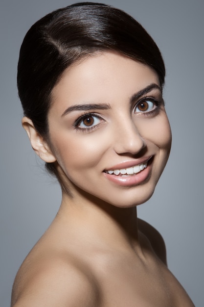 Skincare. Beautiful, natural woman with cute smile