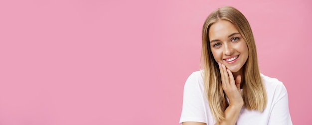 Skincare beauty and skin positive concept charming and tender caucasian girl in white tshirt touchin